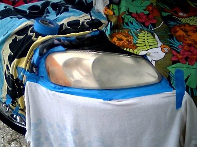 headlight taped and ready to clean