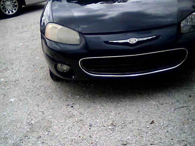 front of car with foggy headlight