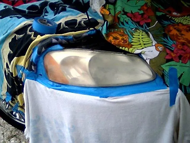 headlight taped and ready to clean