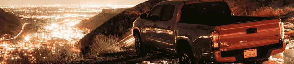 Tacoma pickup overlooking city lights