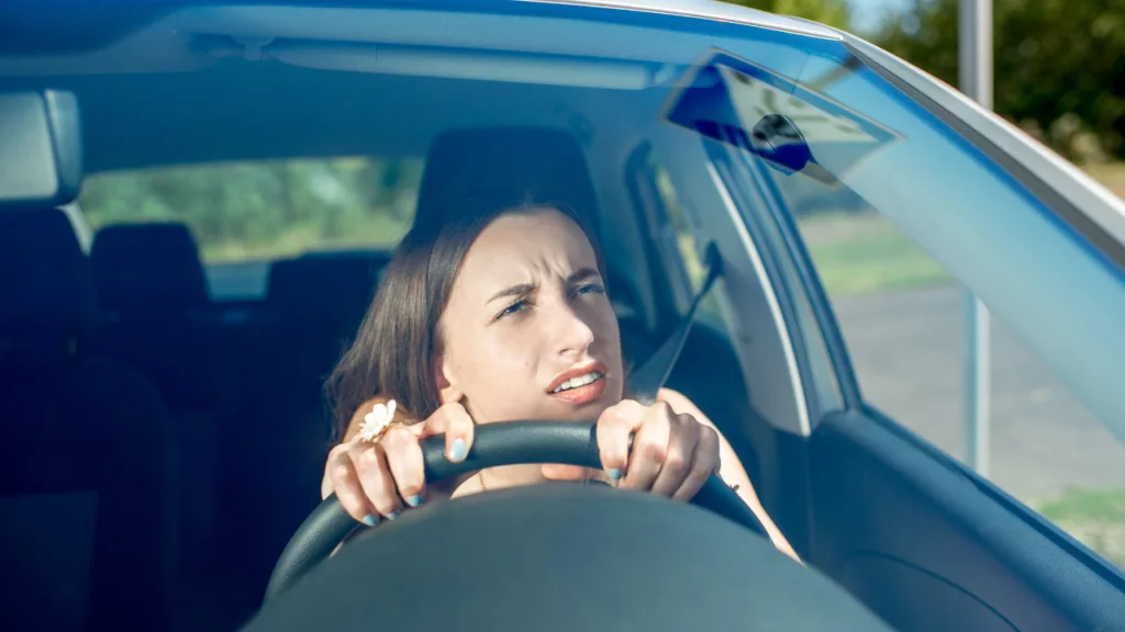 woman listening to windshield